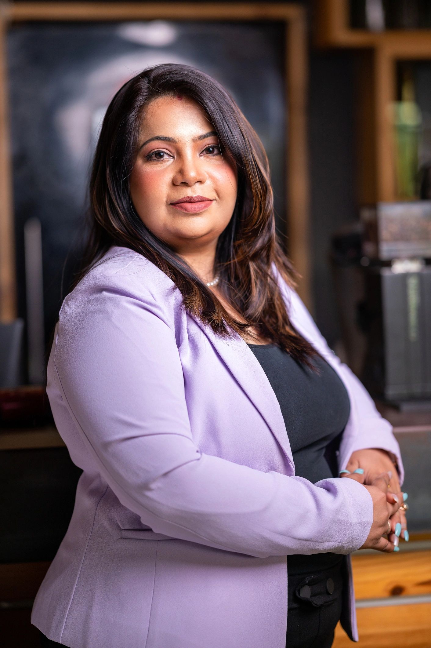 Professional headshot of a business executive